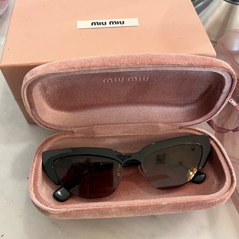 Miu Miu sunglasses. Worn once. Like new.